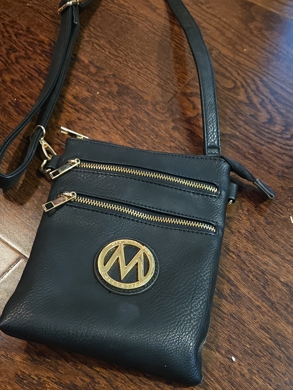 Michael Kors Black Leather Crossbody Bag with Gold MK Emblem